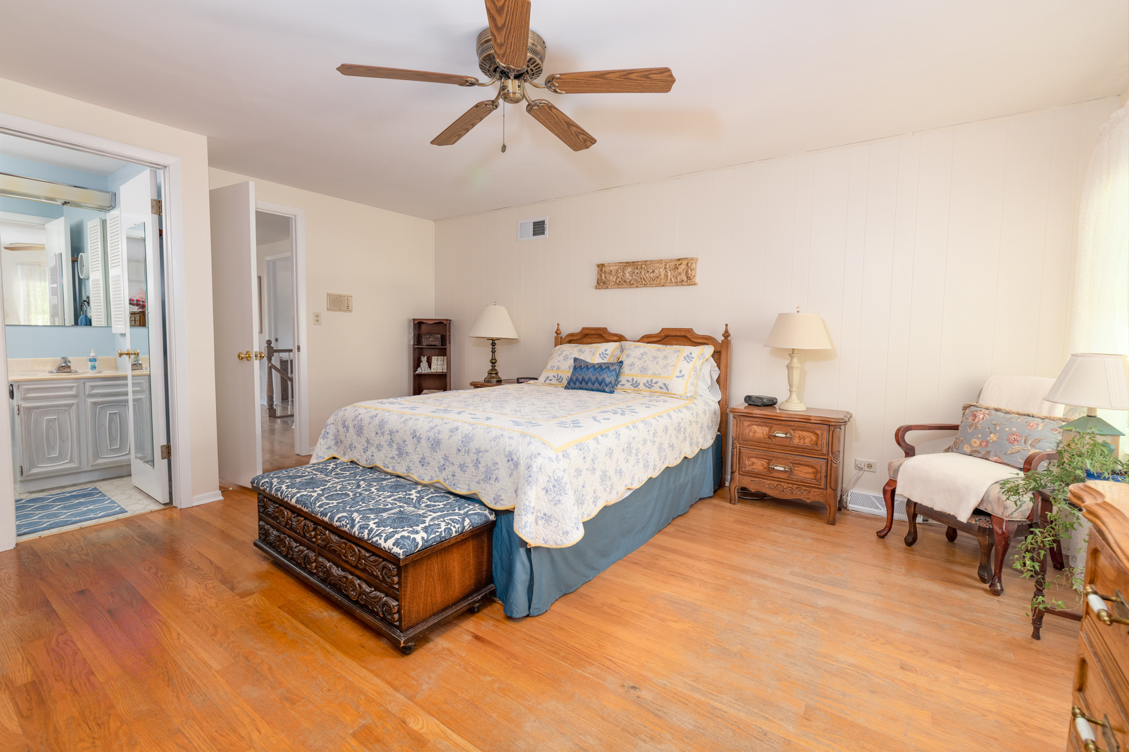 546 Northgate Road Lindenhurst, IL 60046 - Photo 12 of 26 a bedroom with a bed and ceiling fan