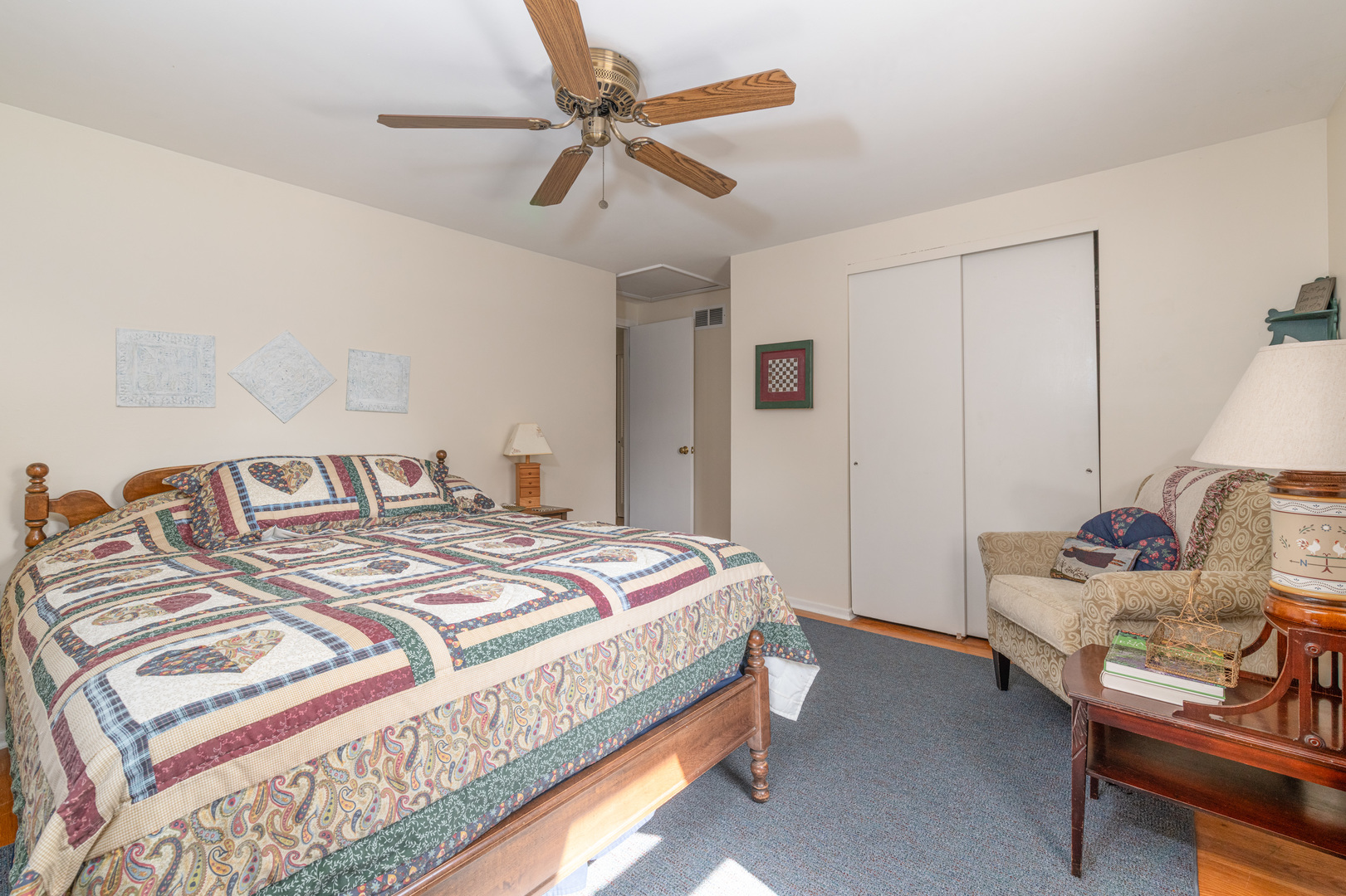 546 Northgate Road Lindenhurst, IL 60046 - Photo 16 of 26 a bedroom with a bed and a chandelier