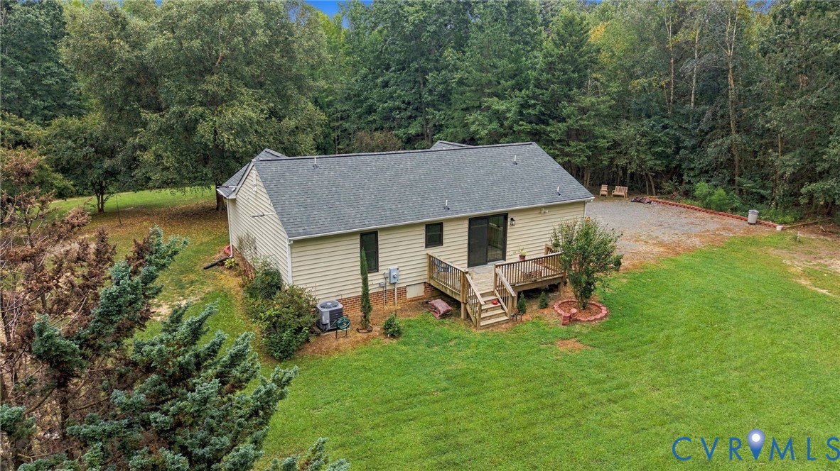 133 Ford Road Bumpass, VA 23024 - Photo 38 of 55 Vinyl siding exterior with a dark shingle roof, a