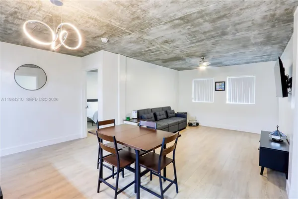 a view of a dining room with furniture