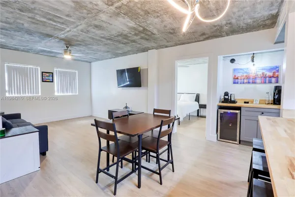 a view of a dining room with furniture