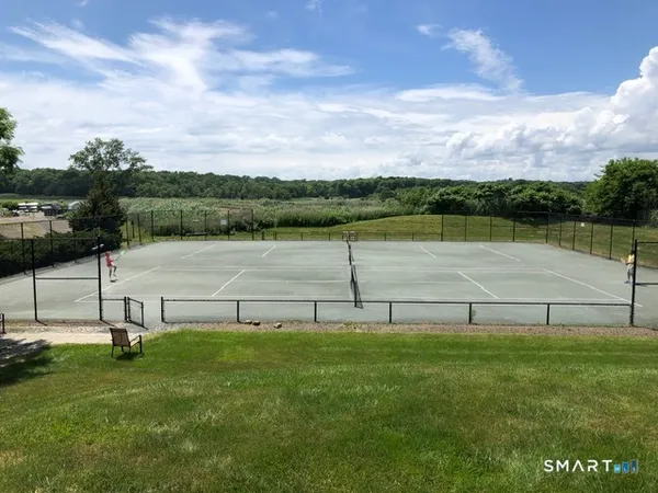 a view of a lake with a yard