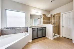 a view of a livingroom with a kitchen