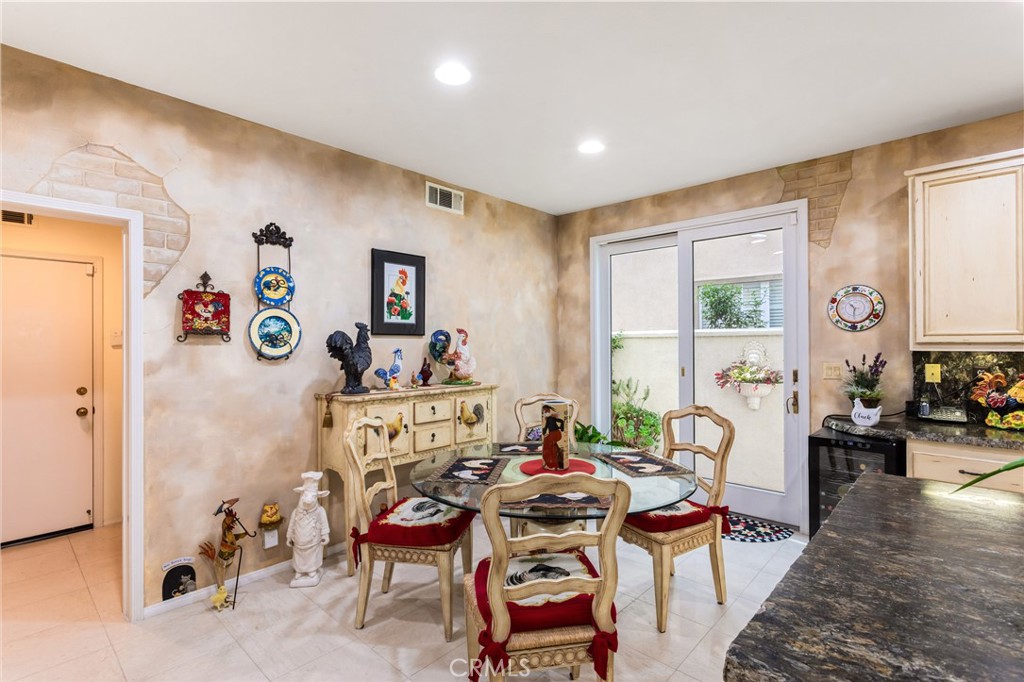 12665 Stanton Avenue Tustin, CA 92782 - Photo 13 of 52 a living room with furniture and a wooden floor