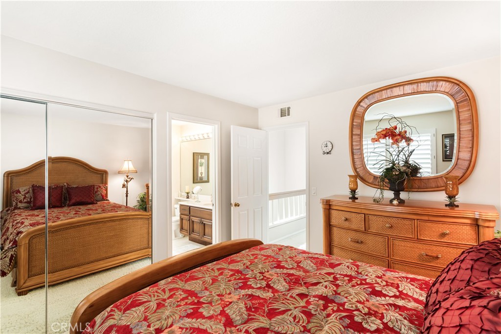 12665 Stanton Avenue Tustin, CA 92782 - Photo 27 of 52 a bedroom with a bed and a dresser