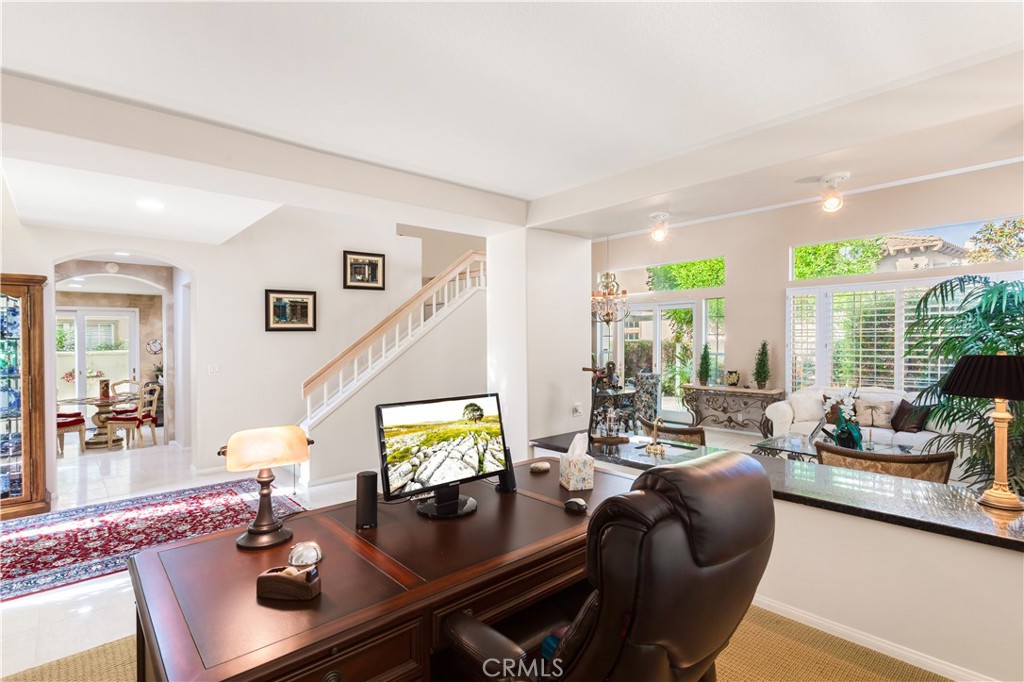 12665 Stanton Avenue Tustin, CA 92782 - Photo 3 of 52 a living room with furniture and large windows