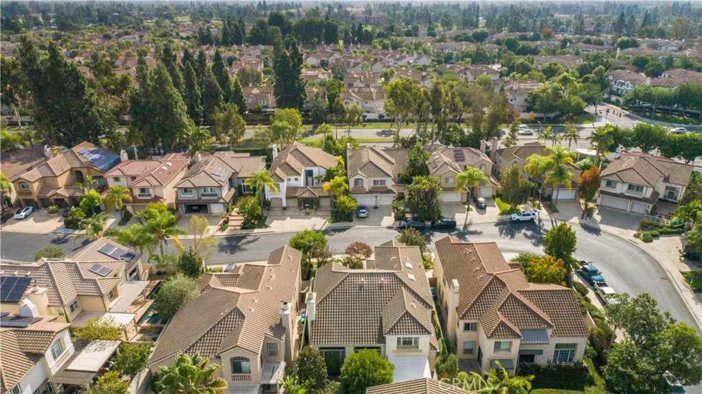 12665 Stanton Avenue Tustin, CA 92782 - Photo 48 of 52 an aerial view of residential building with outdoor space