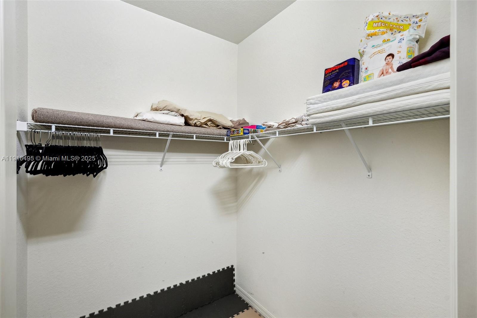 9064 Capistrano Street North, Unit 5004 Naples, FL 34113 - Photo 20 of 27 a close view of water heater room