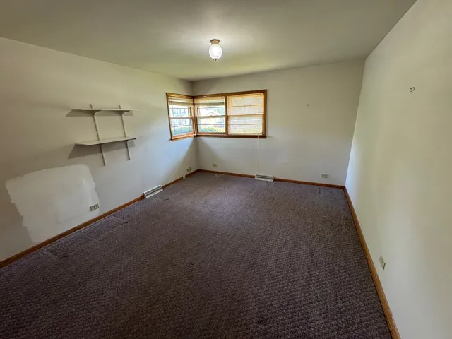 a en suite bathroom with a sink and mirror