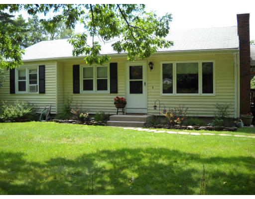 118 Town Farm Road Monson, MA 01057 - Photo 1 of 1 a front view of a house with a yard