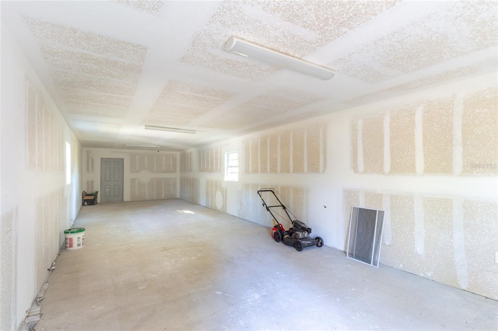 6447 Brandy Drive Spring Hill, FL 34607 - Photo 21 of 25 a view of a room with gym equipment