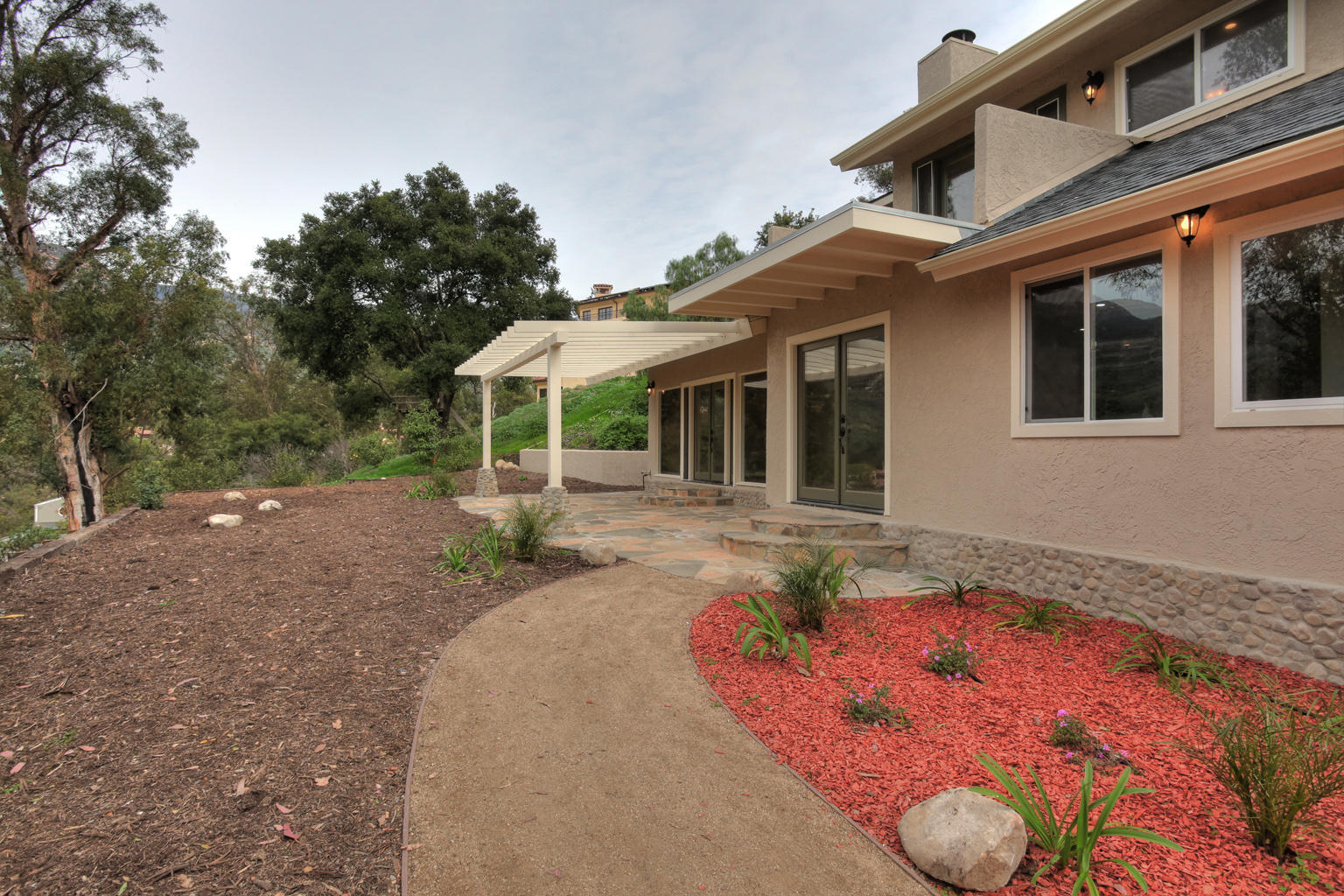 75 Canon View Road Santa Barbara, CA 93108 - Photo 21 of 31 a front view of a house with a yard