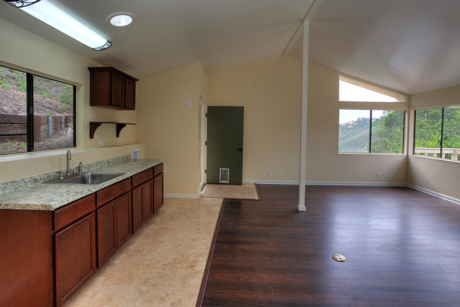 75 Canon View Road Santa Barbara, CA 93108 - Photo 26 of 31 a kitchen with granite countertop a sink and a stove top oven