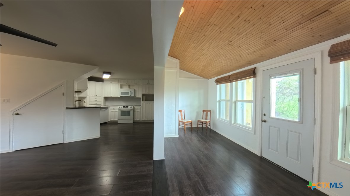 929 Red Bluff Ranch Road Pipe Creek, TX 78063 - Photo 7 of 37 Living room and sunroom/Dining room