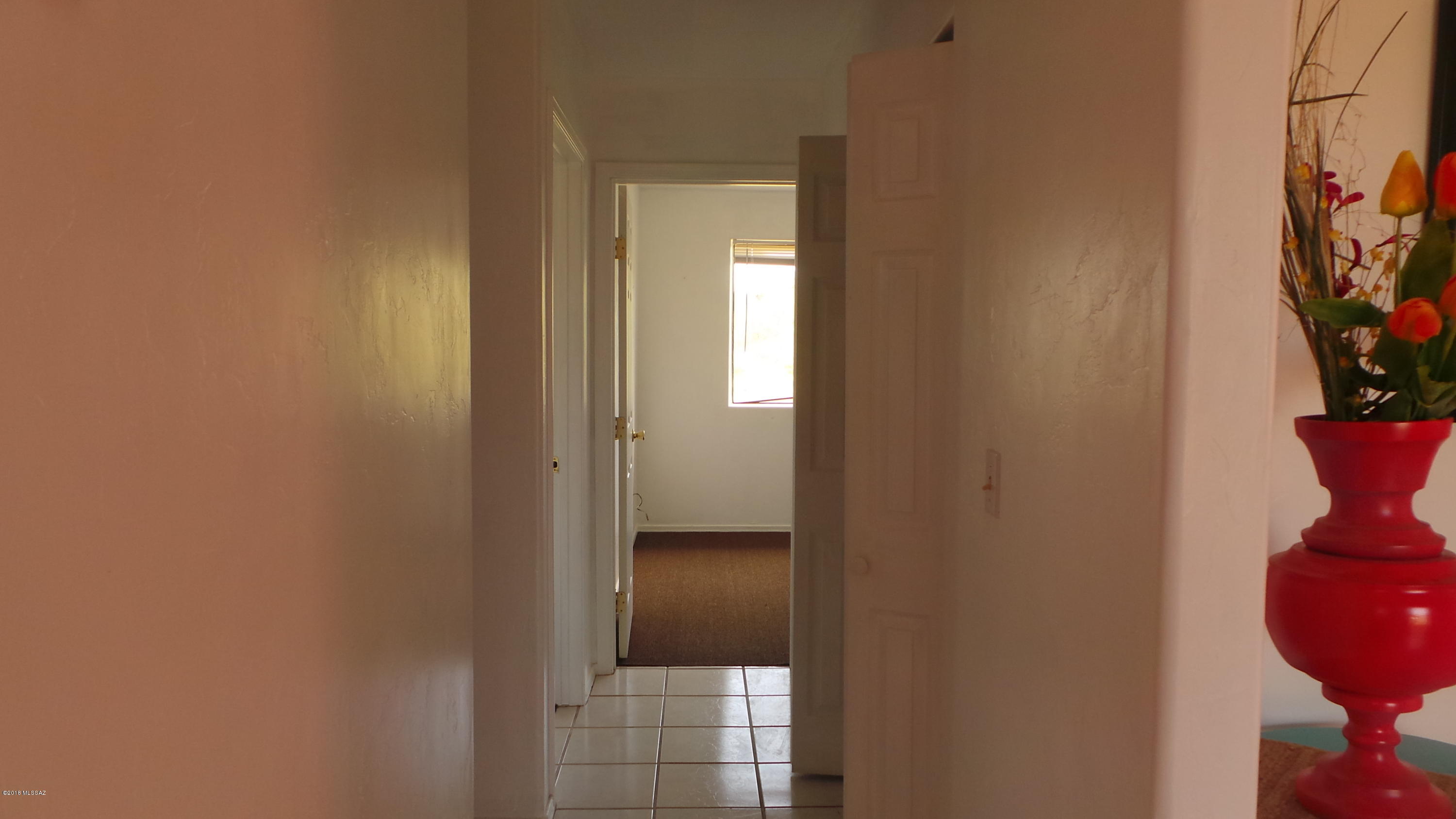 294 Placita Managua Rio Rico, AZ 85648 - Photo 13 of 33 a view of entryway with wooden floor
