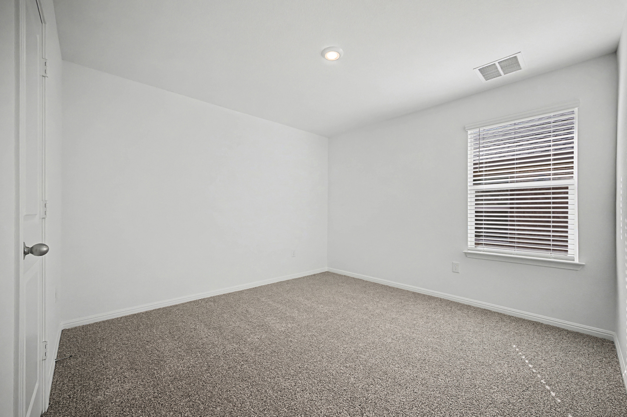 1908 Pogonip Place Leander, TX 78641 - Photo 12 of 21 Unfurnished room featuring baseboards and carpet