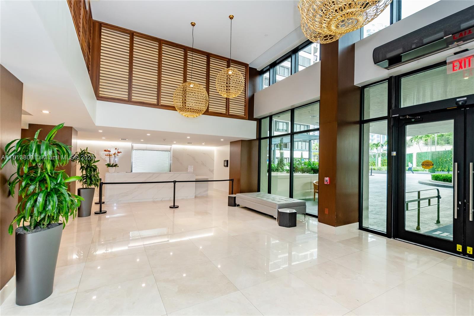 540 Brickell Key Drive, Unit 905 Miami, FL 33131 - Photo 2 of 43 a hallway with a large window