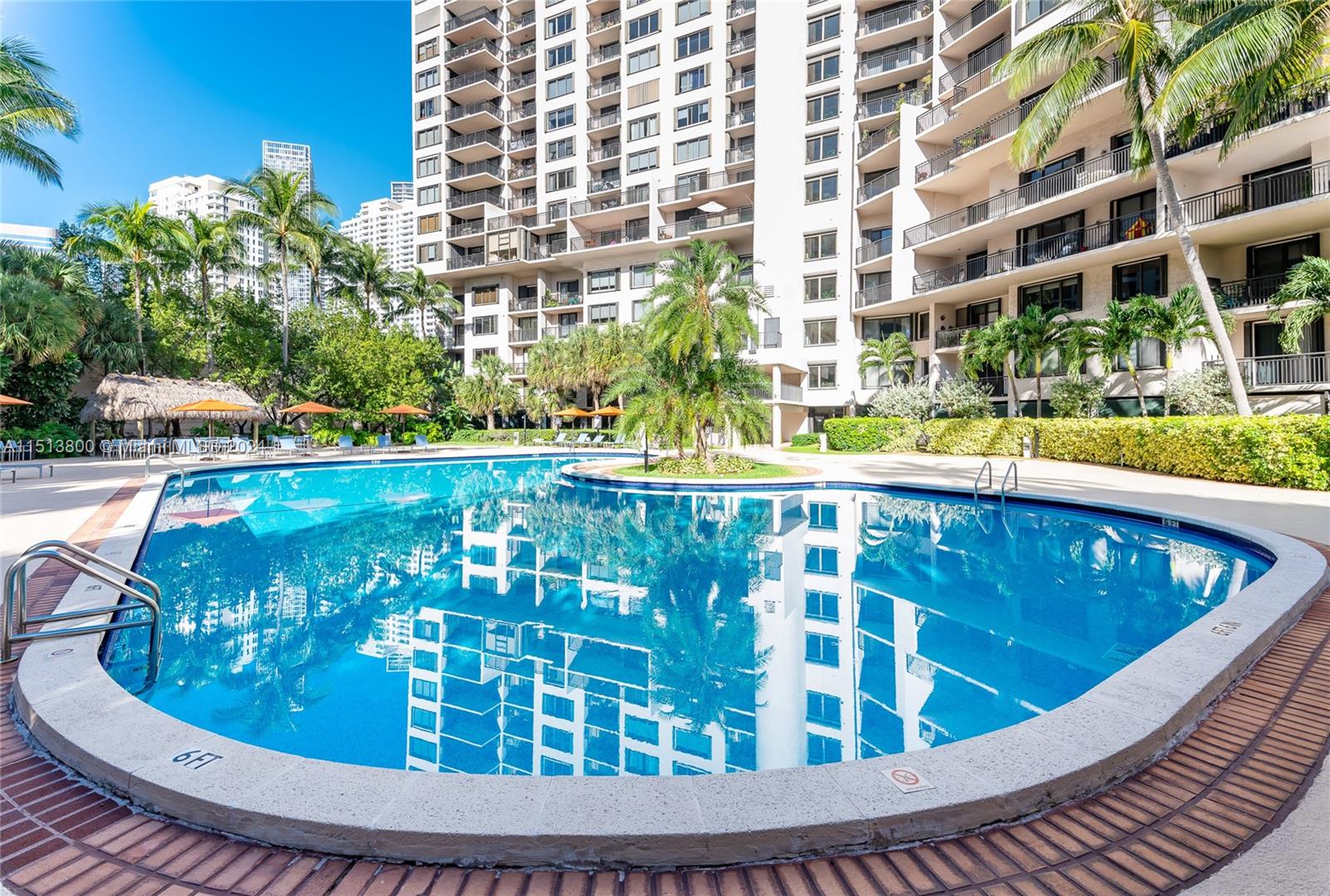 540 Brickell Key Drive, Unit 905 Miami, FL 33131 - Photo 26 of 43 a view of swimming pool from a balcony