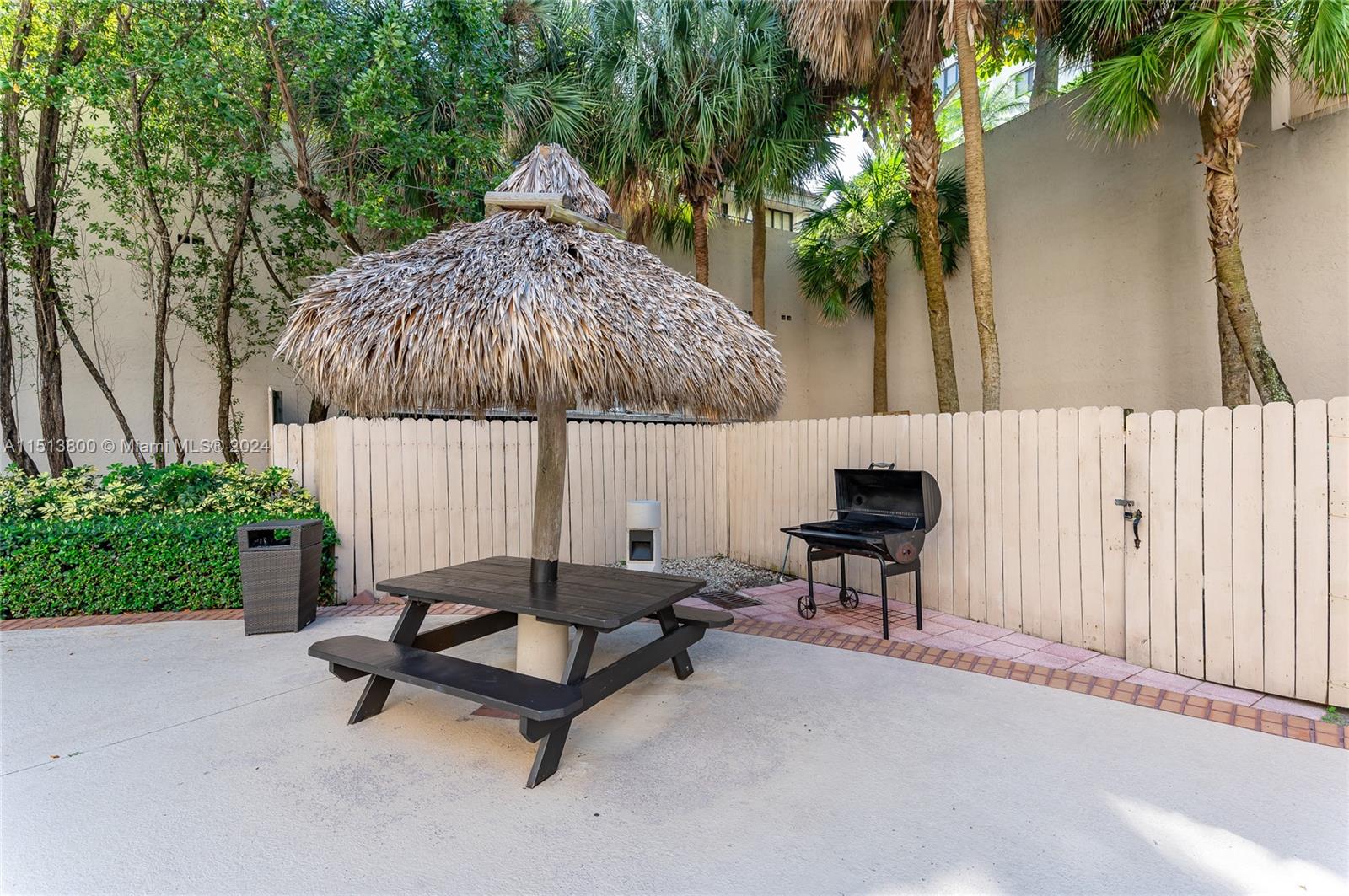 540 Brickell Key Drive, Unit 905 Miami, FL 33131 - Photo 30 of 43 a bench sitting in the middle of a house
