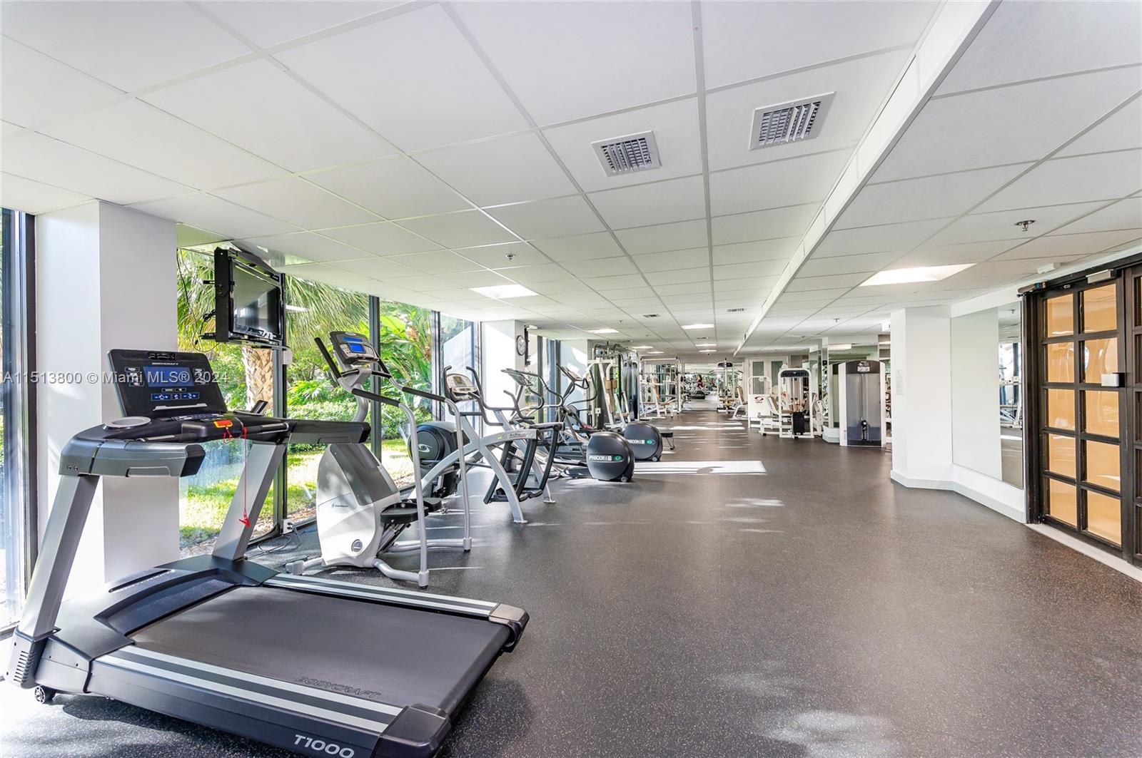 540 Brickell Key Drive, Unit 905 Miami, FL 33131 - Photo 34 of 43 a view of a room with gym equipment