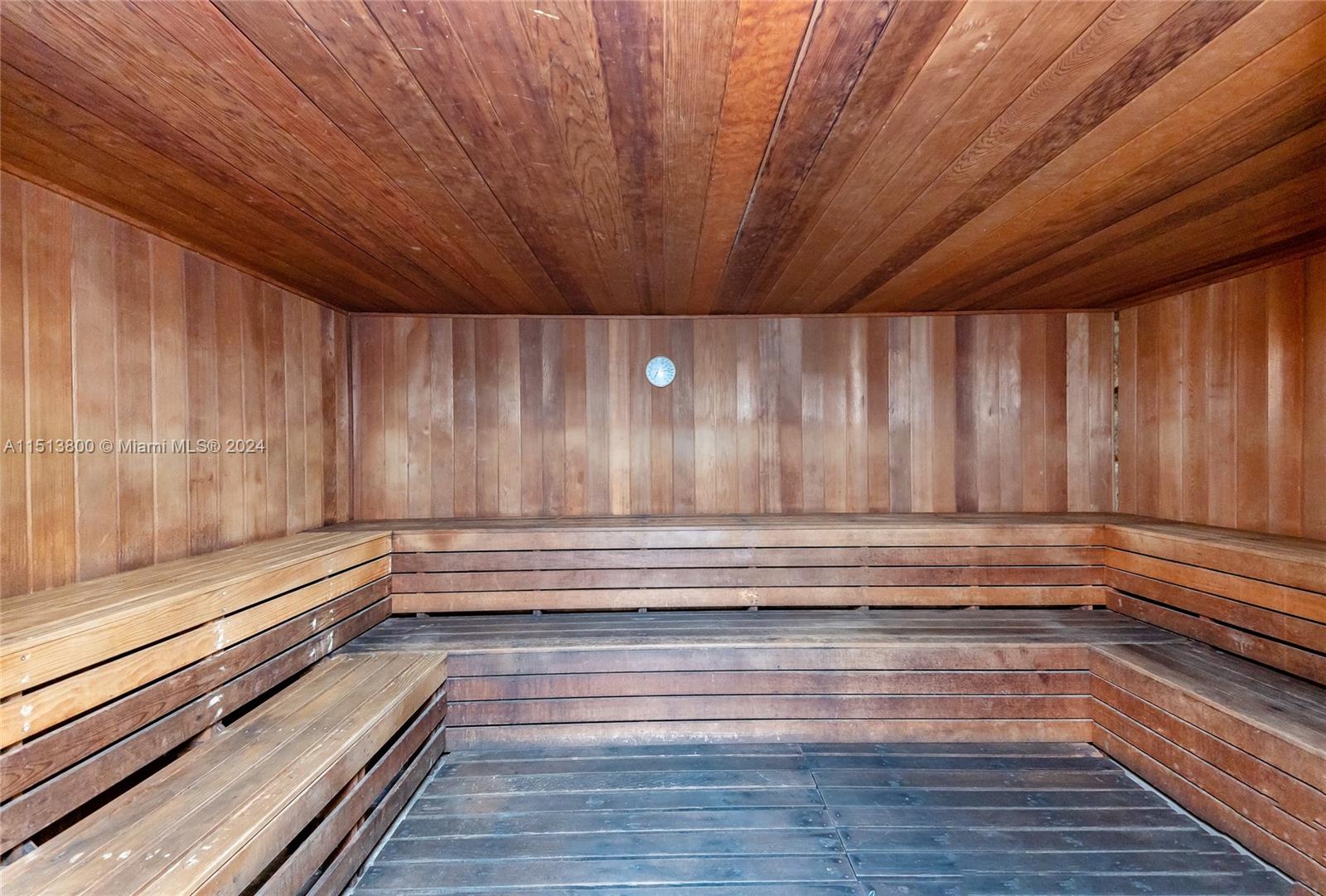 540 Brickell Key Drive, Unit 905 Miami, FL 33131 - Photo 39 of 43 a view of room with wooden floor and staircase