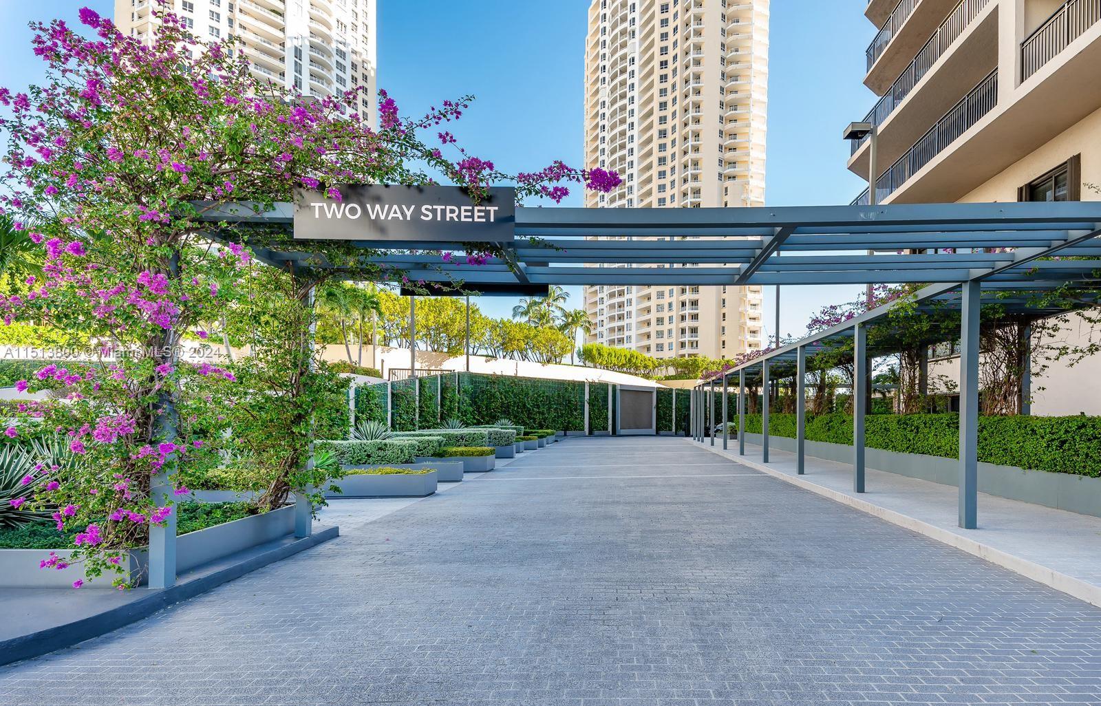 540 Brickell Key Drive, Unit 905 Miami, FL 33131 - Photo 5 of 43 a view of a room with lots of flowers