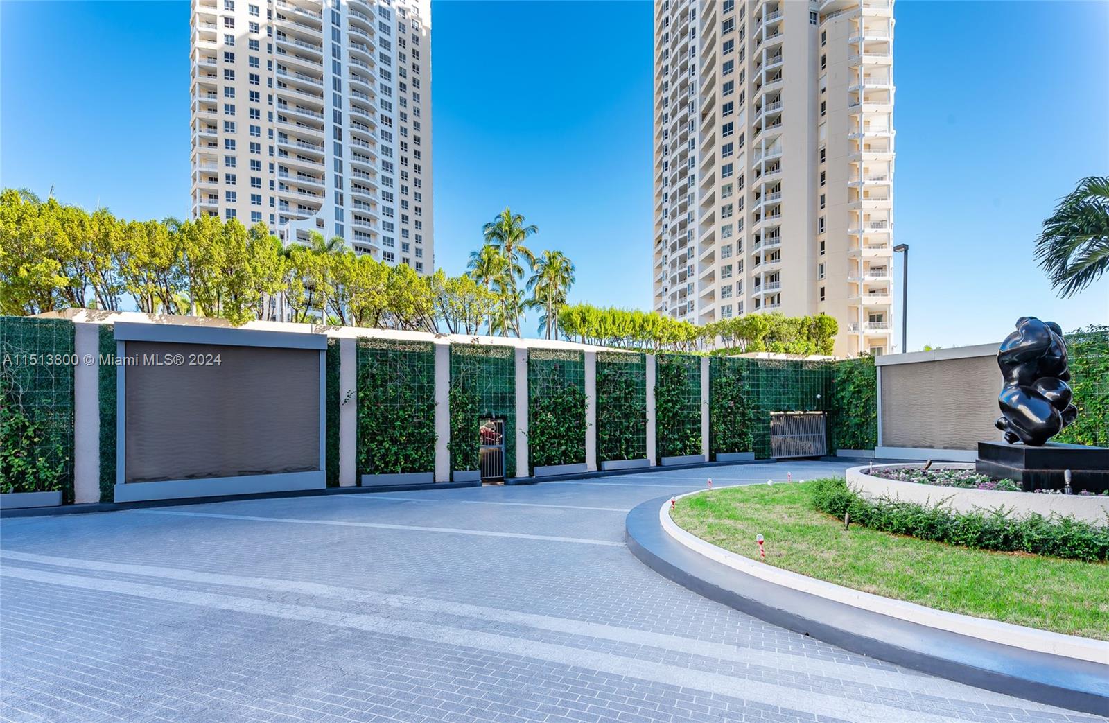 540 Brickell Key Drive, Unit 905 Miami, FL 33131 - Photo 6 of 43 front view of a house with a yard