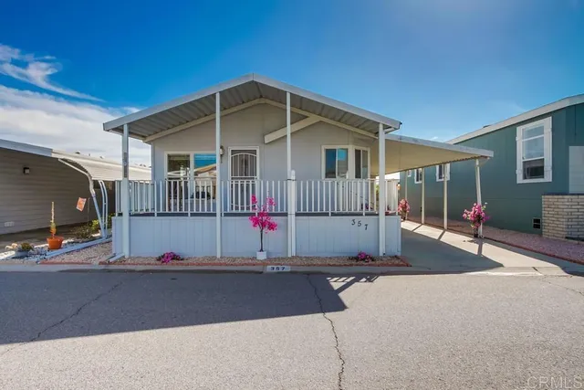 a front view of a house with garage