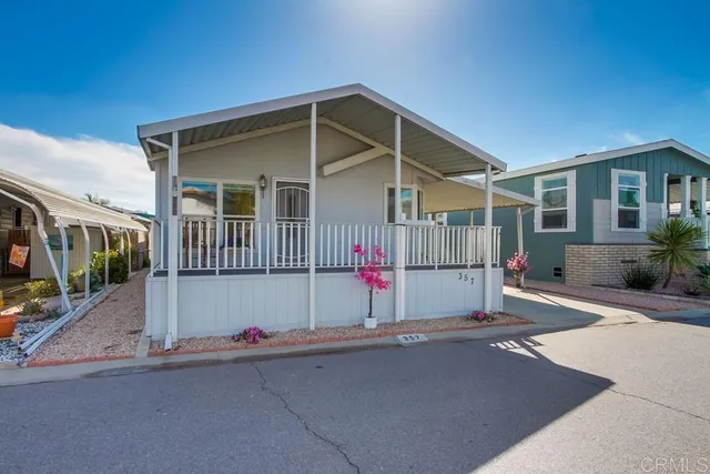 a front view of a house with a garage