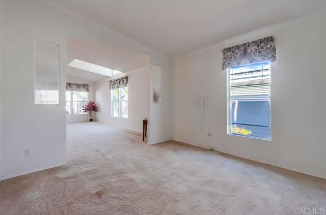 an empty room with a bathroom