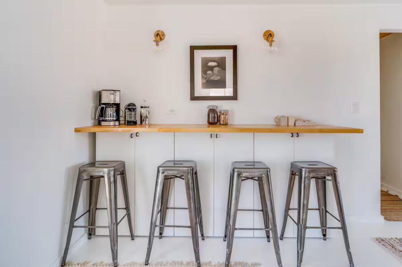 57725 Junipero Trail Yucca Valley, CA 92284 - Photo 23 of 46 a view of a kitchen with stainless steel appliances granite countertop a refrigerator and a stove top oven