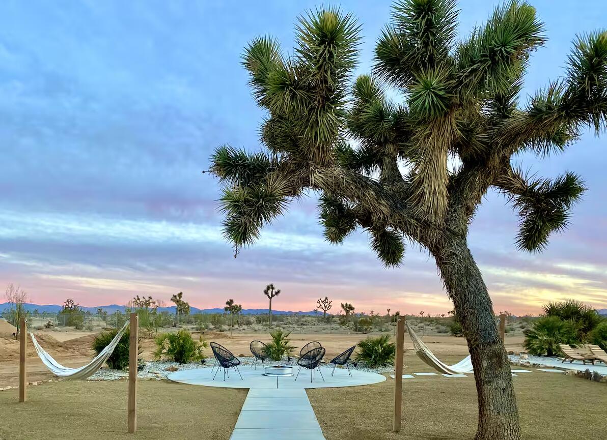 57725 Junipero Trail Yucca Valley, CA 92284 - Photo 29 of 46 a view of a lake with a mountain in the background