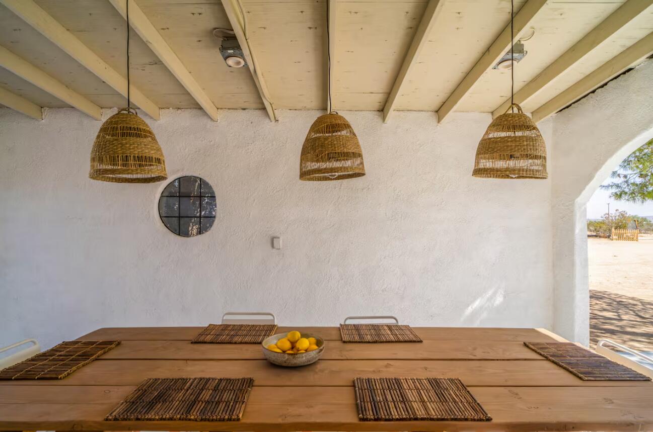 57725 Junipero Trail Yucca Valley, CA 92284 - Photo 35 of 46 a view of a bedroom with two beds and window