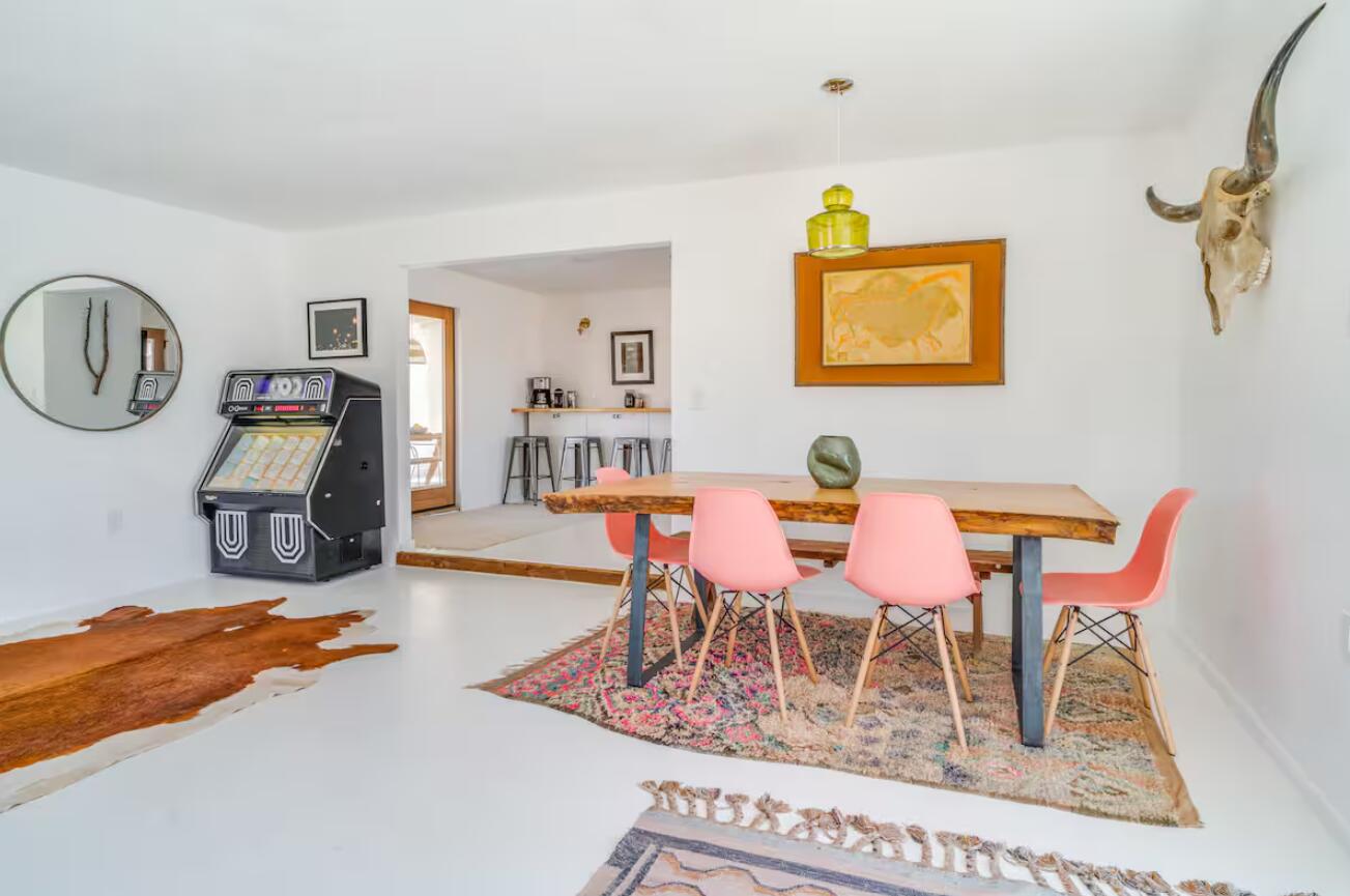 57725 Junipero Trail Yucca Valley, CA 92284 - Photo 6 of 46 a dining room with furniture and a rug