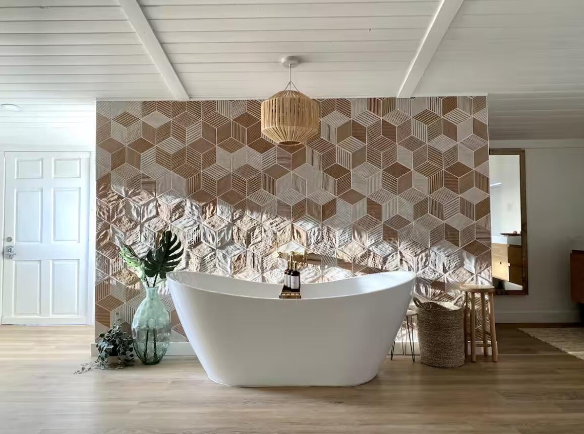 57725 Junipero Trail Yucca Valley, CA 92284 - Photo 8 of 46 a white vase with flowers sitting on a table