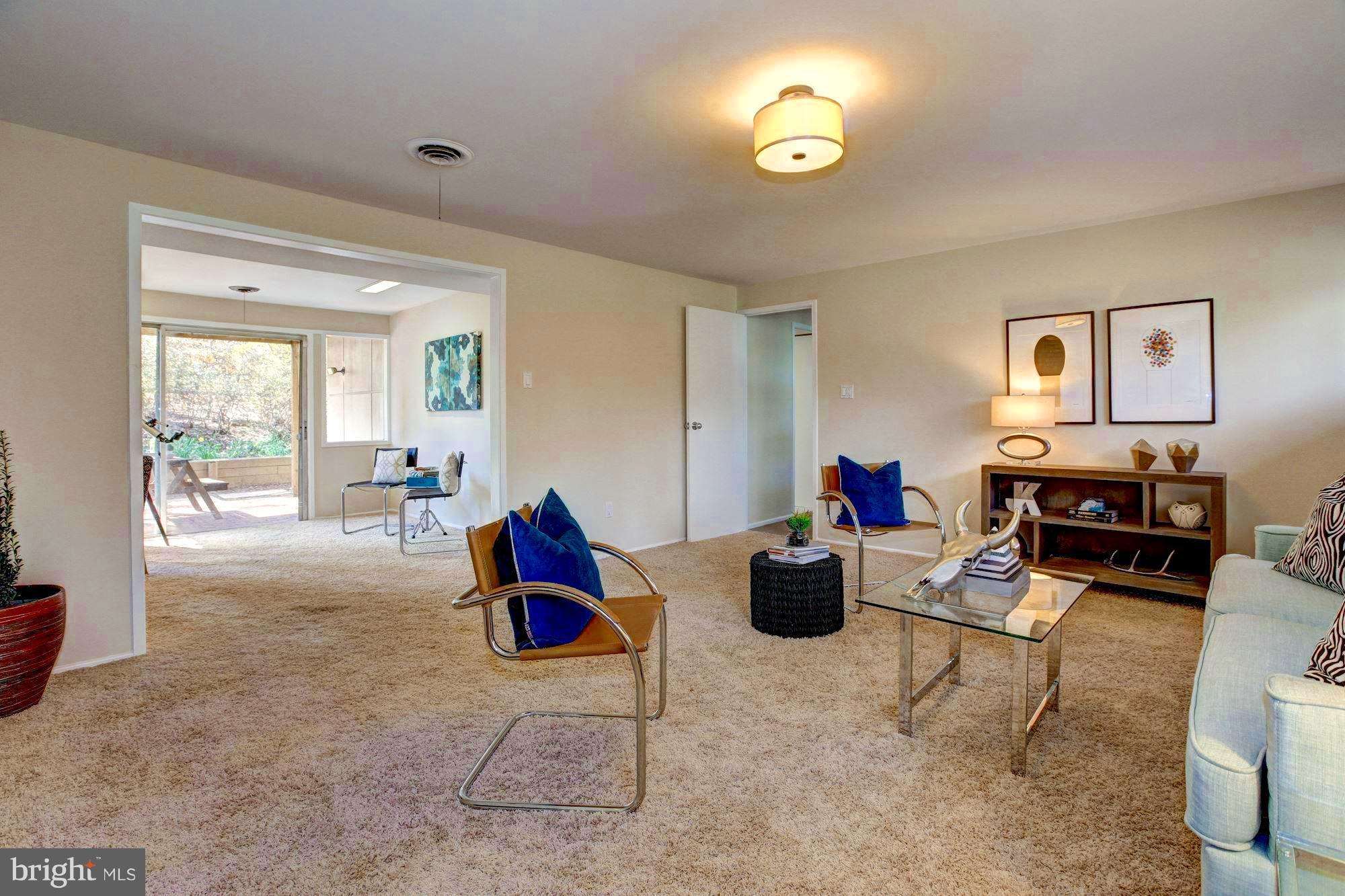 7904 Hamilton Spring Road Bethesda, MD 20817 - Photo 24 of 30 Family room's two sections allow for flexible use