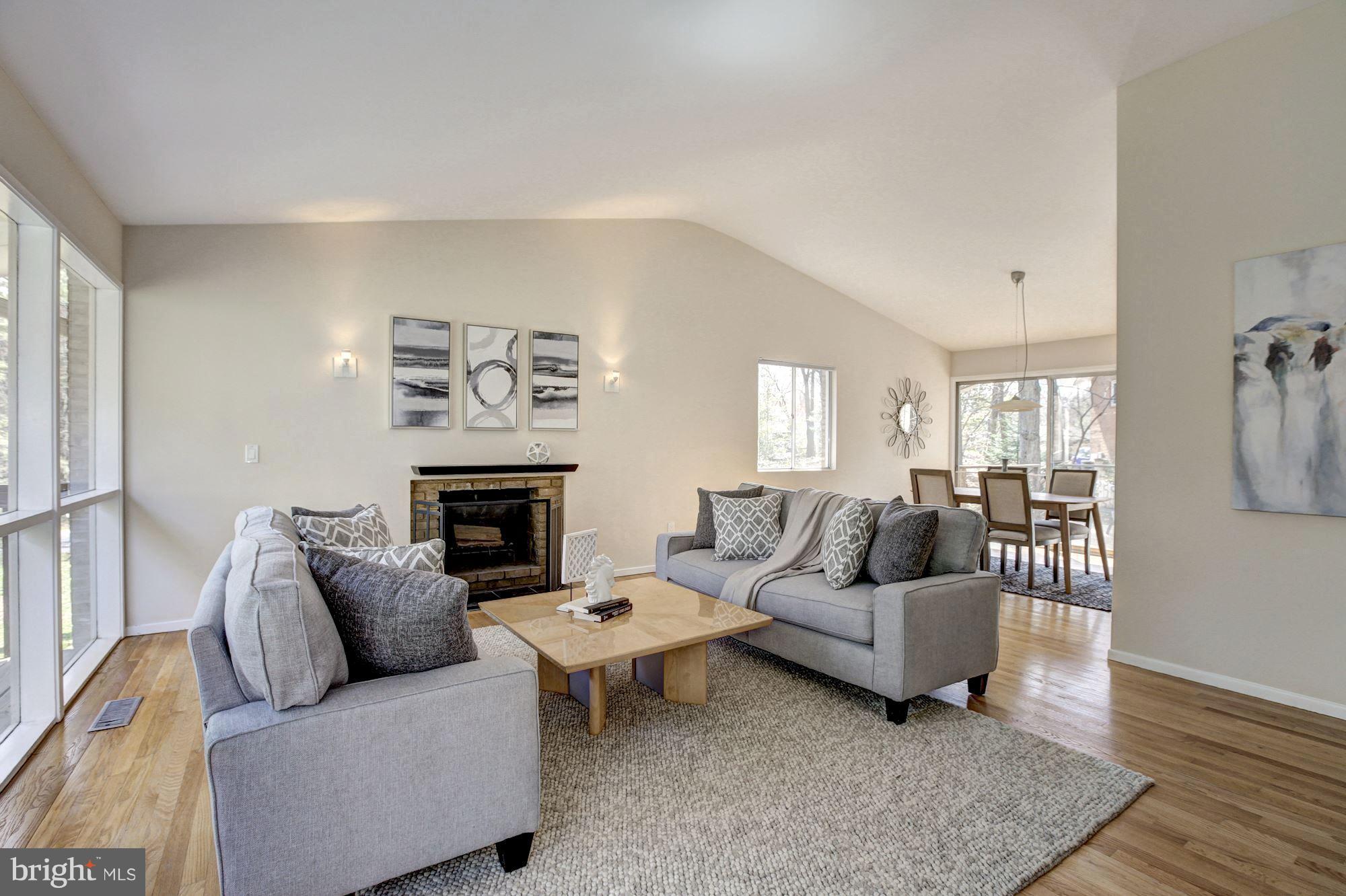 7904 Hamilton Spring Road Bethesda, MD 20817 - Photo 5 of 30 Stunning mix of modern design & cozy fireplace