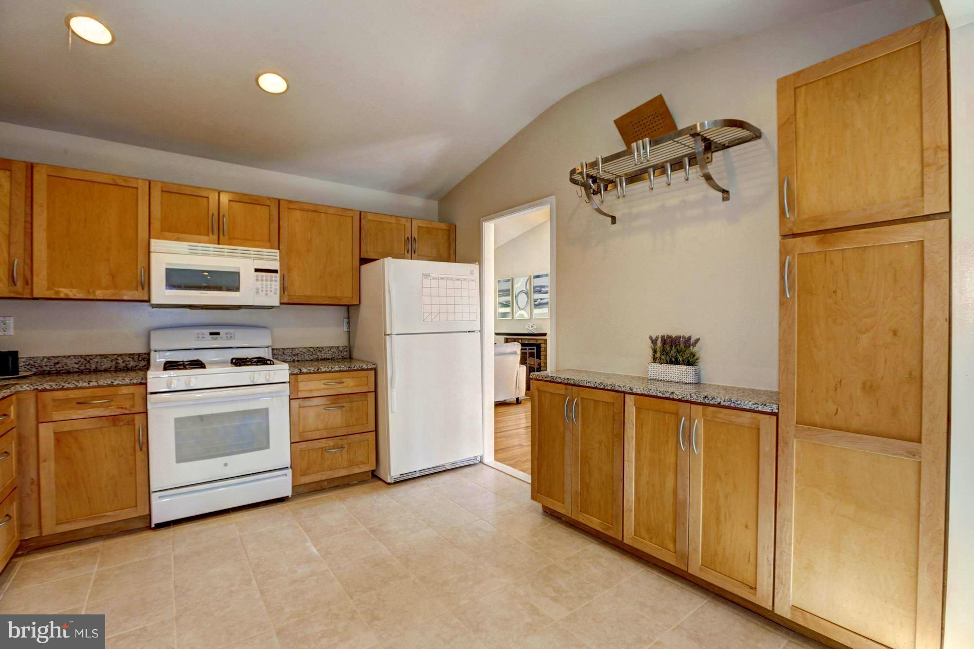 7904 Hamilton Spring Road Bethesda, MD 20817 - Photo 8 of 30 Newer appliances, granite, new floor hilght kitchn