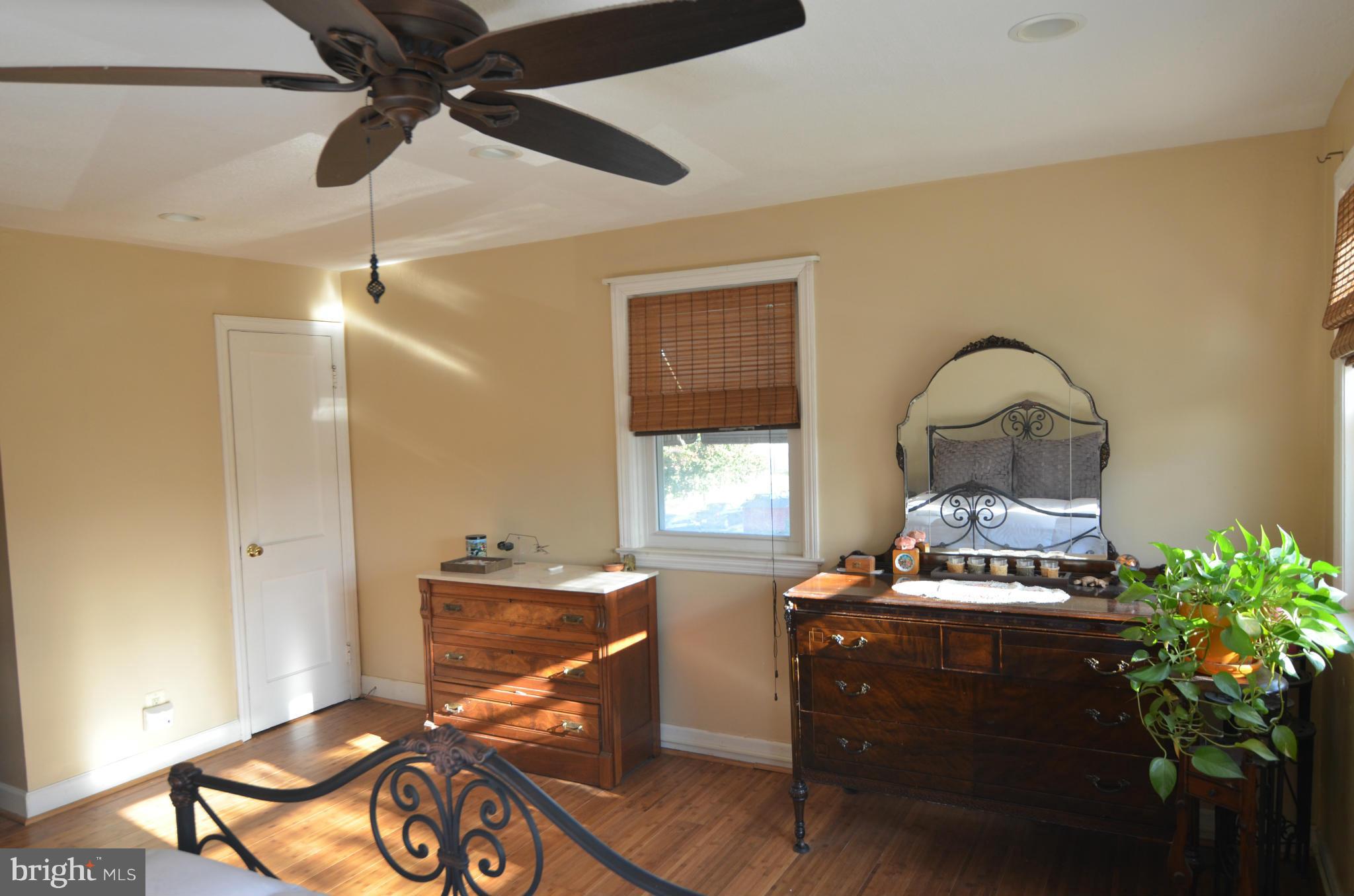 600 Old Riverside Road Baltimore, MD 21225 - Photo 11 of 15 a living room with furniture and a window