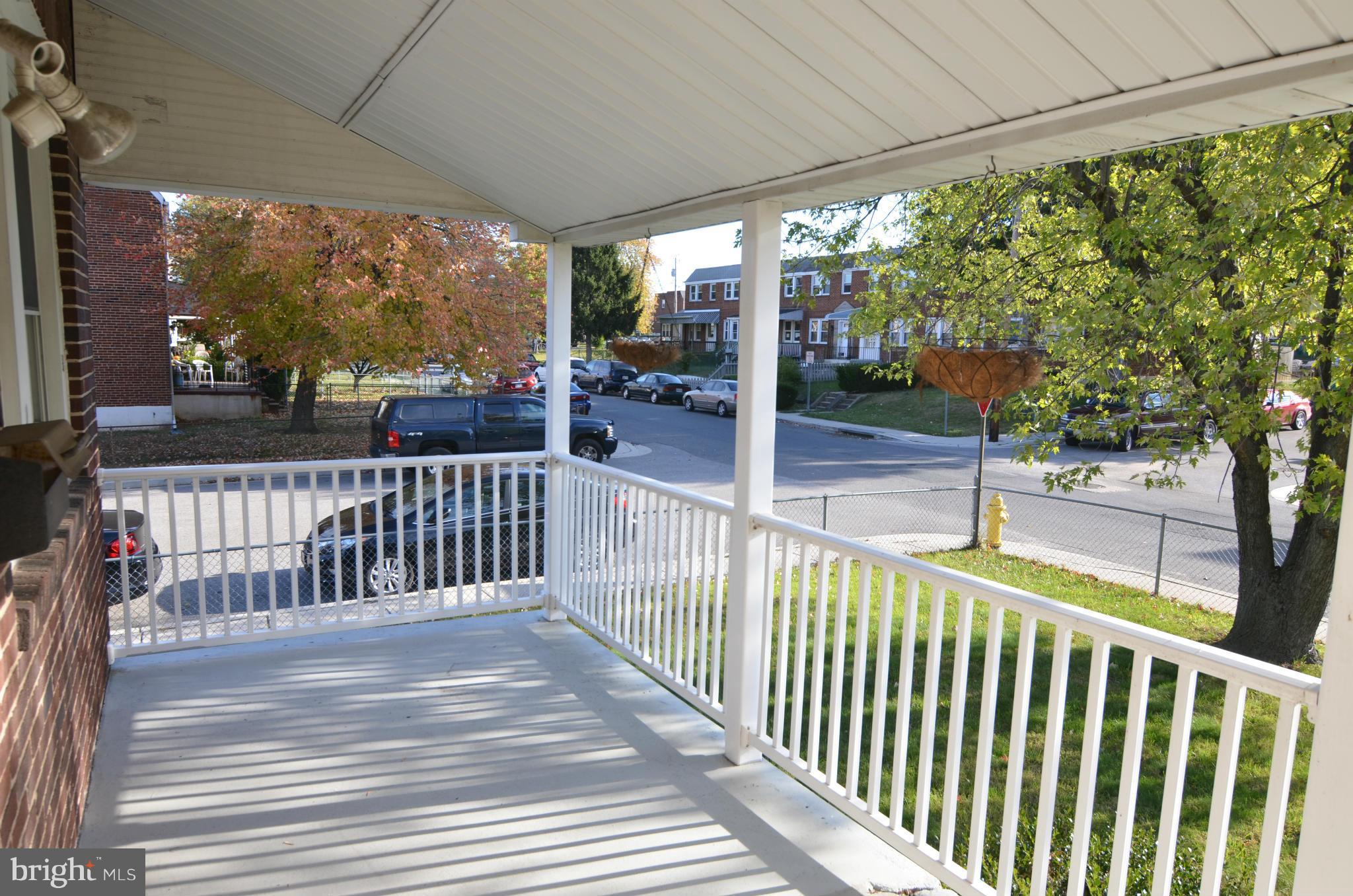 600 Old Riverside Road Baltimore, MD 21225 - Photo 12 of 15 a view of a porch with wooden floor