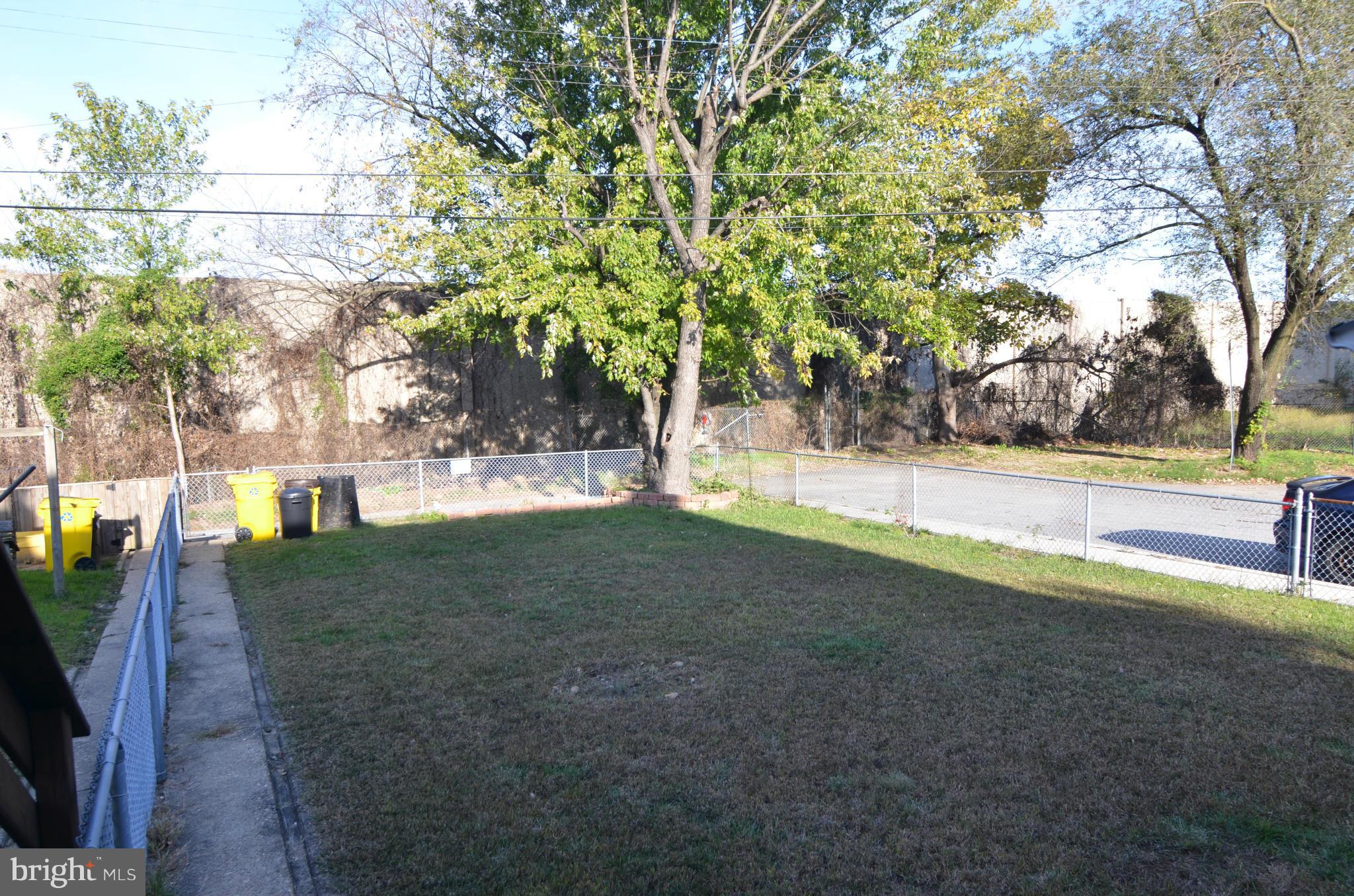 600 Old Riverside Road Baltimore, MD 21225 - Photo 14 of 15 a view of a yard with plants and trees