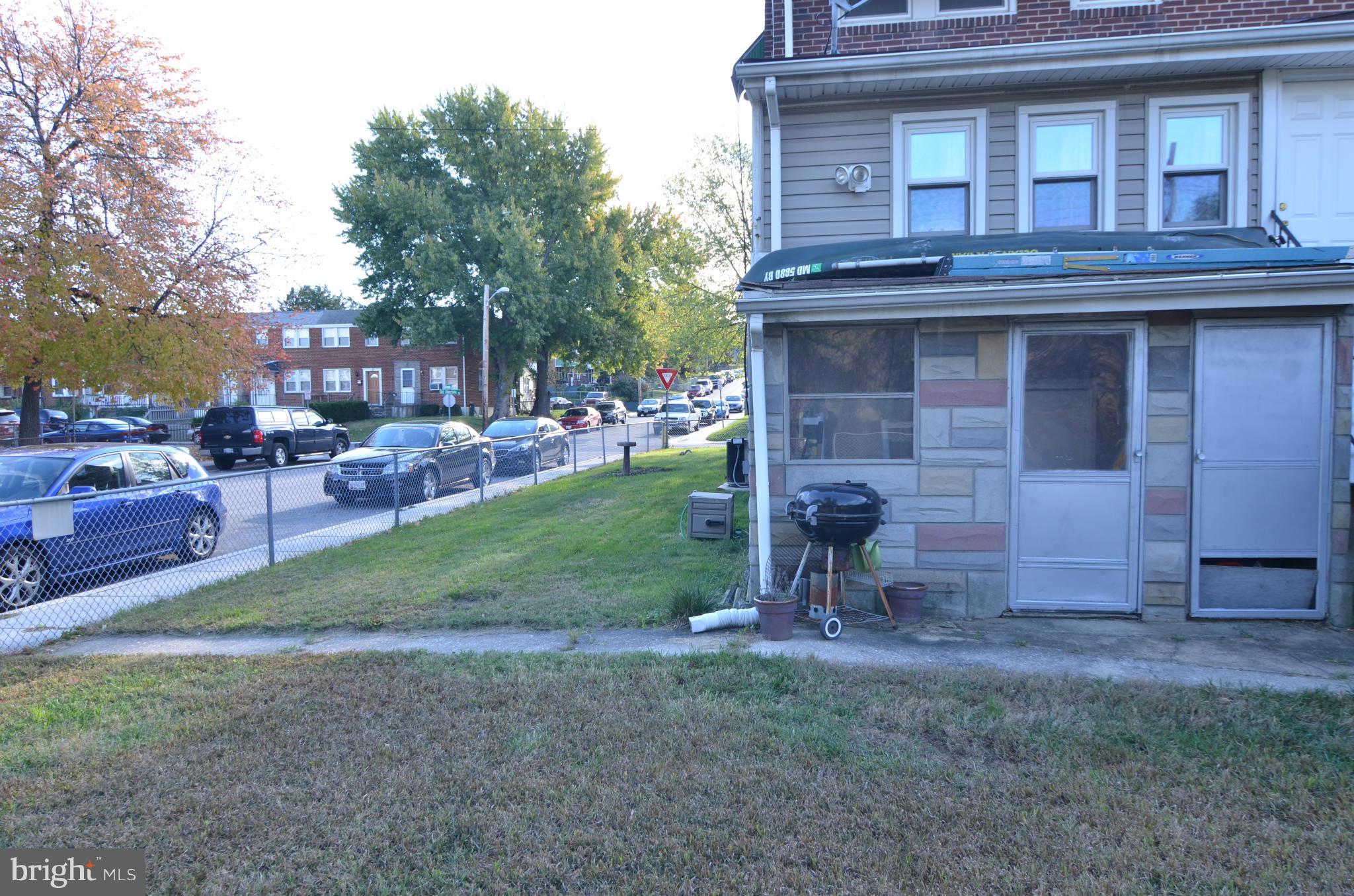 600 Old Riverside Road Baltimore, MD 21225 - Photo 15 of 15 a view of a house with a yard and sitting area