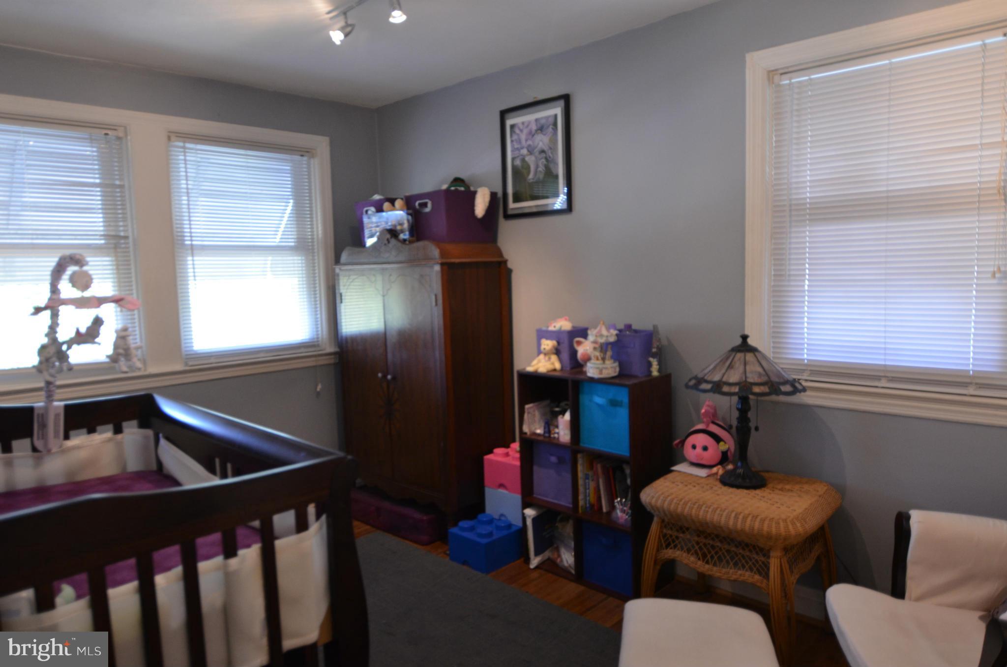600 Old Riverside Road Baltimore, MD 21225 - Photo 9 of 15 a living room with furniture and a window