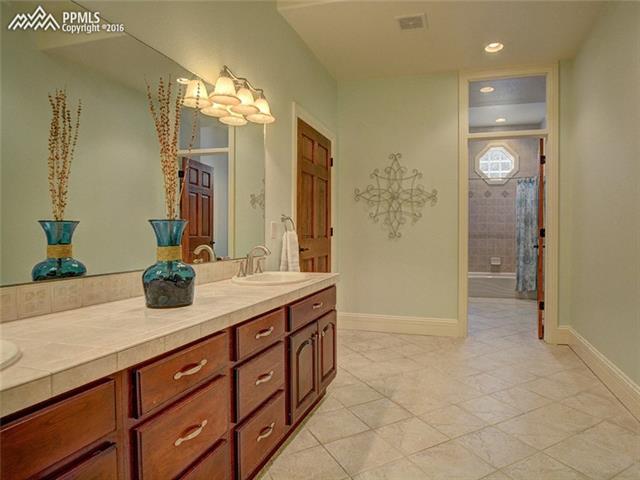 15925 Winding Trail Road Colorado Springs, CO 80908 - Photo 27 of 36 Lower Level Full Bathroom