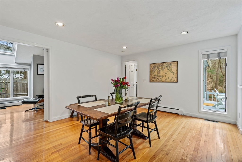 19 Stinson Road Andover, MA 01810 - Photo 11 of 40 a view of a dining room with furniture window and wooden floor
