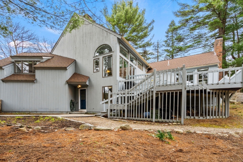 19 Stinson Road Andover, MA 01810 - Photo 32 of 40 a view of a house with a wooden fence