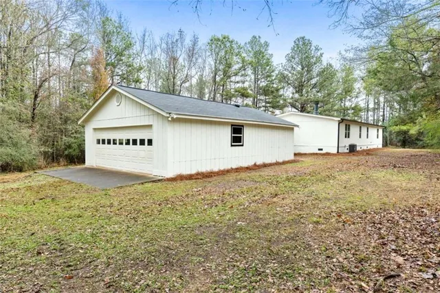 a sign on the side of the house