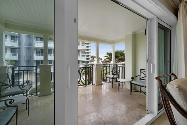 a view of a livingroom with furniture and gym equipment