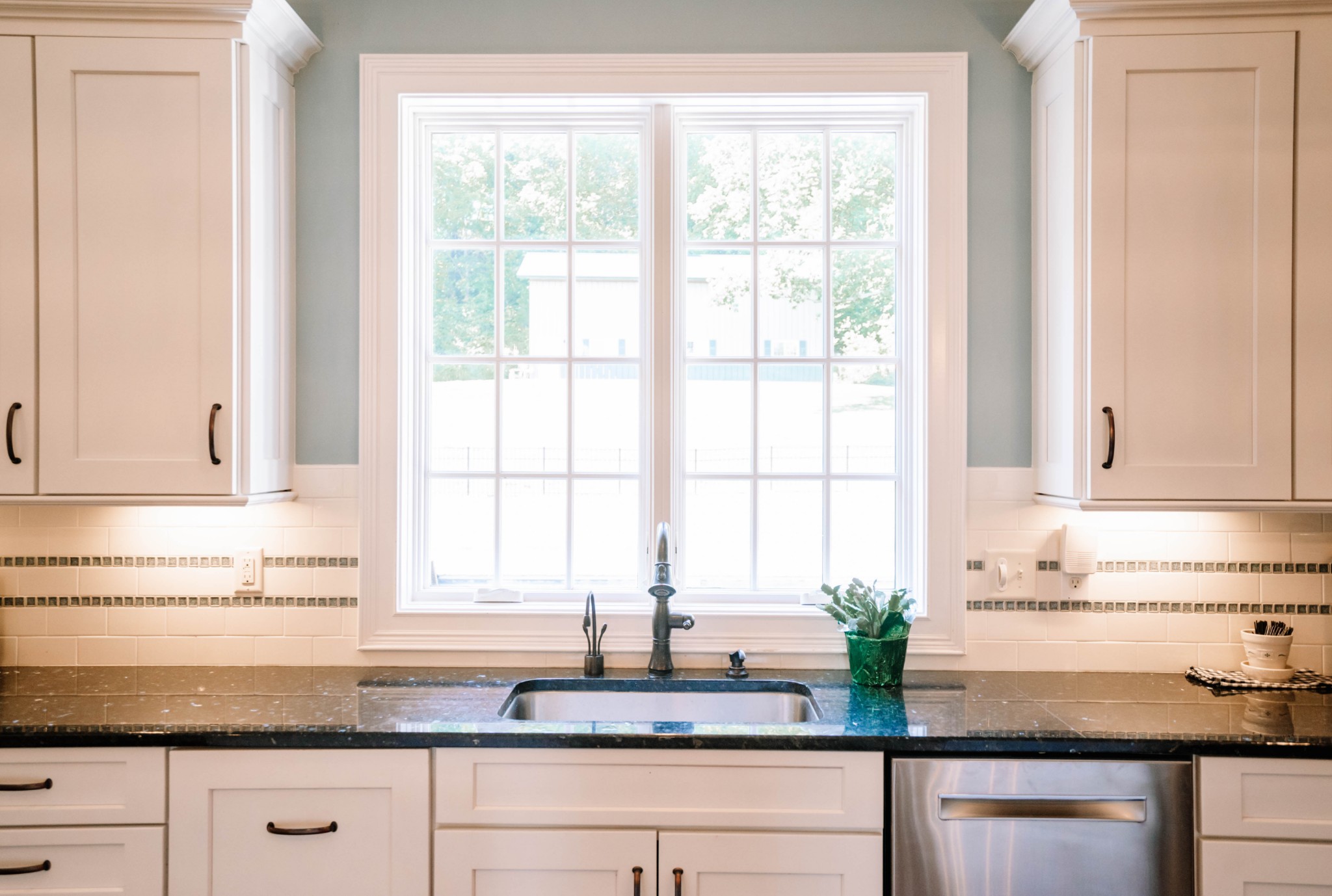 3290 Carl Road Franklin, TN 37064 - Photo 13 of 49 a kitchen with granite countertop white cabinets and a window