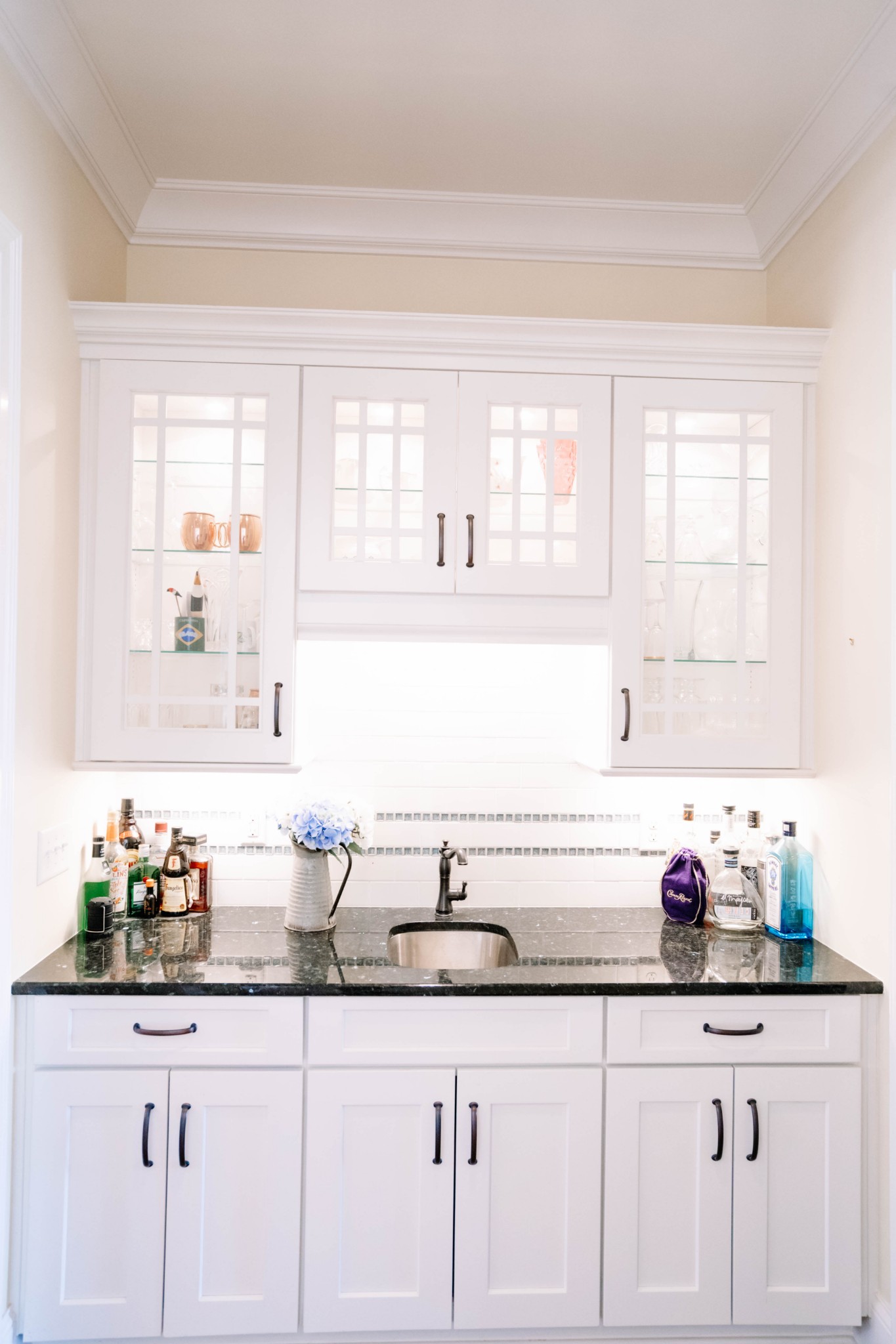 3290 Carl Road Franklin, TN 37064 - Photo 15 of 49 a kitchen with granite countertop a sink white cabinets and a window